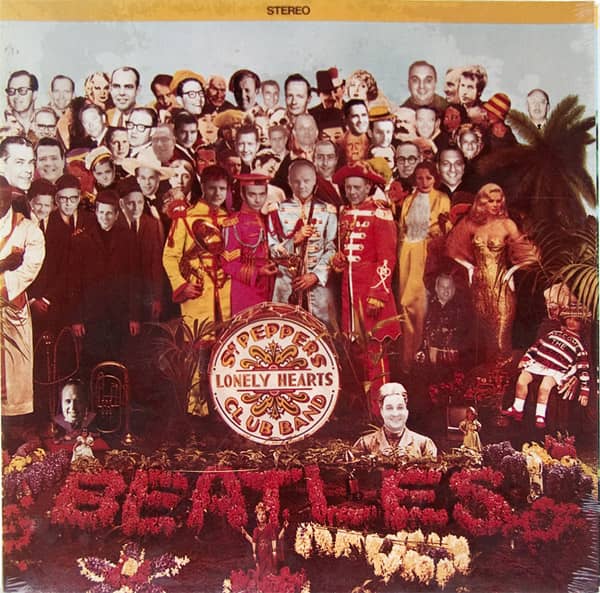 Altered Sgt. Pepper cover with substituted portrait faces, a stereo banner, central drum and floral Beatles lettering